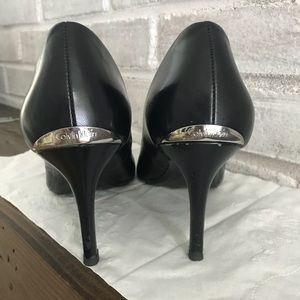 Black Calvin Klein heels with silver detail